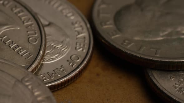 Rotating stock footage shot of American quarters (coin - $0.25) - MONEY 0224