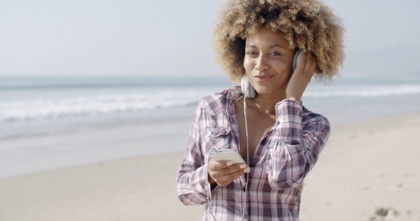 African American Girl Listening To Music