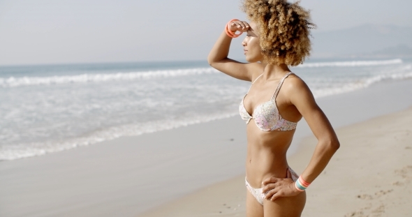 Woman During Sunbath On Tropical Beach