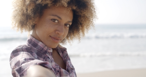 Portrait Of Young Black Woman Near The Sea.