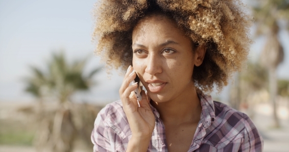 Woman Talking With Mobile Phone