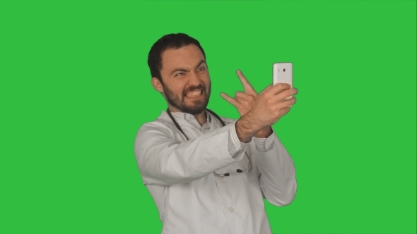 Doctor Or Medic Taking a Selfie With Front Camera
