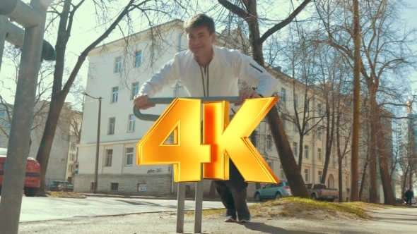 Man Doing Sports Using Bike Parking Rack