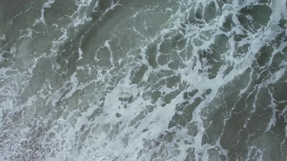 Overhead Shot Of Beautiful Waves Crashing On Sandy Beach, Portugal