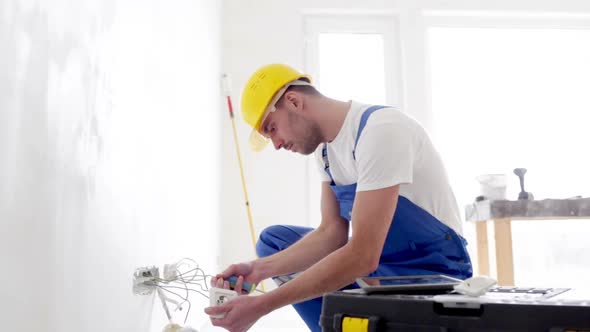 Builder With Tablet Pc And Equipment Indoors 2