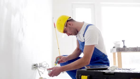 Builder With Tablet Pc And Equipment Indoors 3