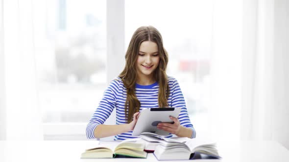 Smiling Student Girl With Tablet Pc And Books 1