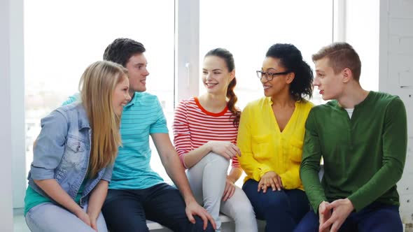 Smiling Students Having Conversation At School 1