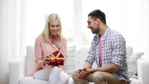 Man Giving Woman Red Heart Shaped Gift Box 5