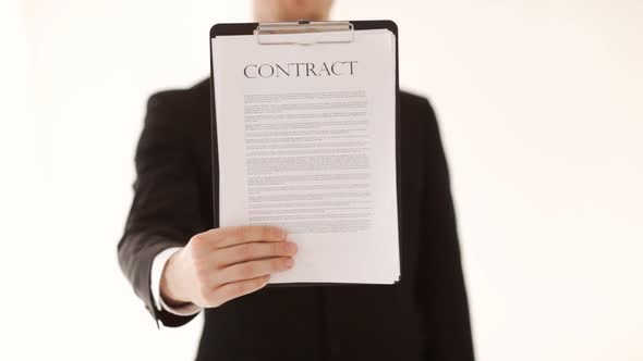 Man Showing A Contract
