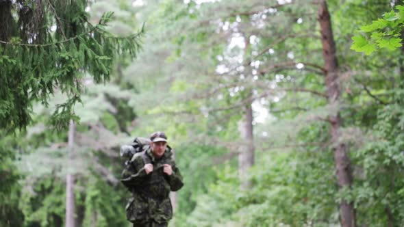 Young Soldier With Backpack In Forest 4