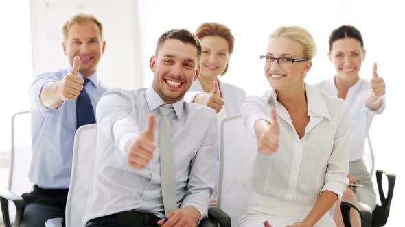 Business People Showing Thumbs Up 1