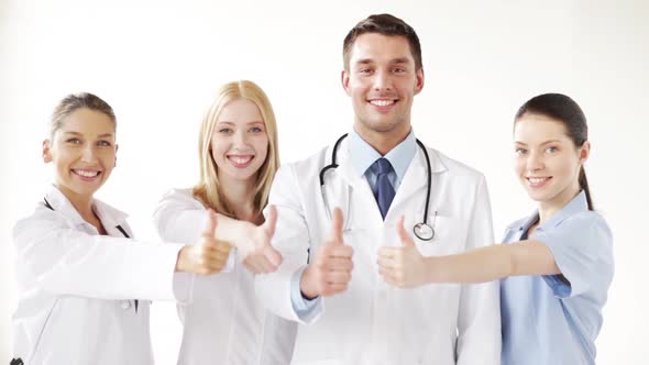 Group Of Doctors With Thumbs Up alt