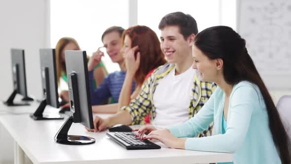 Smiling Students Working With Computers At School 4