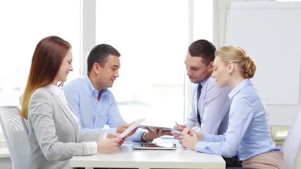 Smiling Team With Table Pc And Papers Working 1