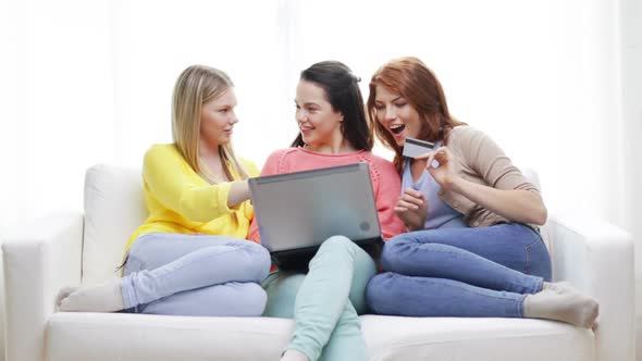 Smiling Teenage Girls With Laptop And Credit Card 1