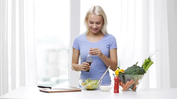 Smiling Woman Cooking Vegetable Salad At Home 1