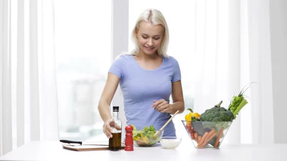 Smiling Woman Cooking Vegetable Salad At Home 2