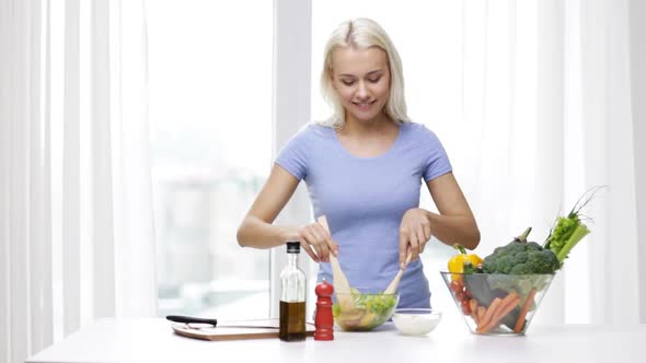 Smiling Woman Cooking Vegetable Salad At Home 3