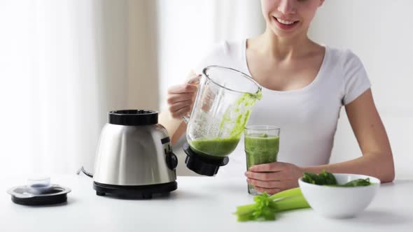 Smiling Woman With Blender Jar And Green Shake 2 alt