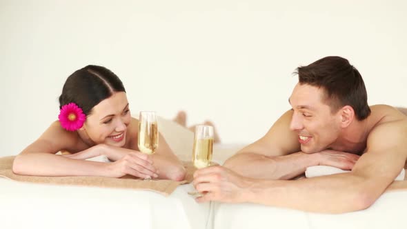 Happy Couple Relaxing In Spa Salon 4