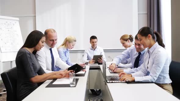 Smiling Business People Meeting In Office 7