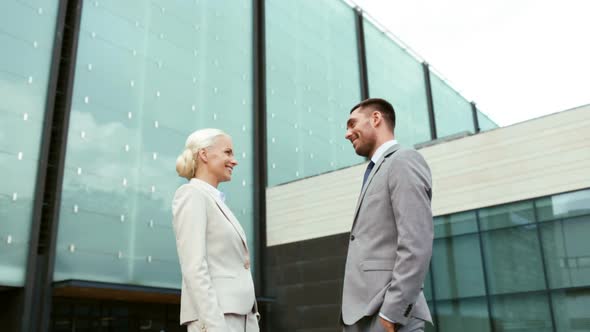 Smiling Businessmen Making High Five 1