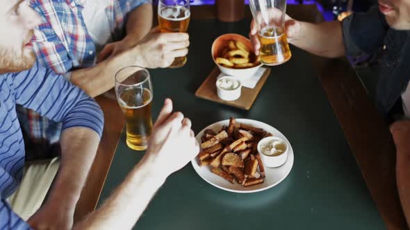 Happy Male Friends Drinking Beer At Bar Or Pub 3