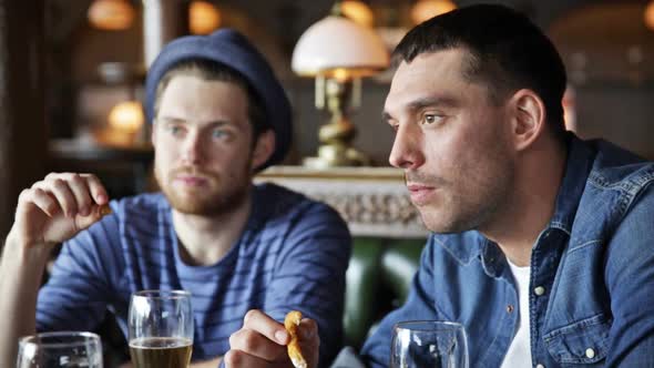 Happy Male Friends Drinking Beer At Bar Or Pub 7