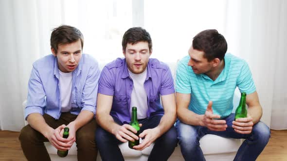 Happy Male Friends With Beer Watching Tv At Home 5