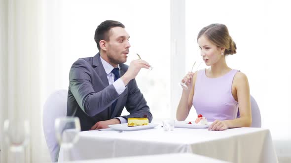 Smiling Couple With Champagne At Restaurant 2