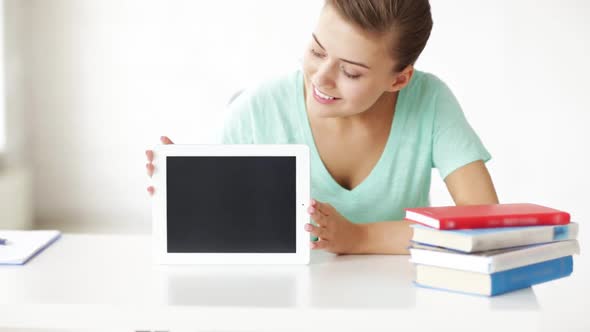 Happy Woman Showing Something On Tablet Pc Screen