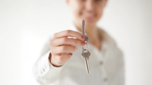 Happy Woman Showing The House Keys 1