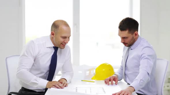 Two Smiling Businessmen Or Architects In Office 4