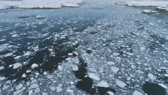 Zodiac Boat Float in Melting Brash Ice Aerial View