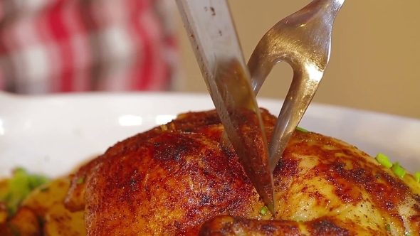 Man Prepare To Serving Roast Chicken