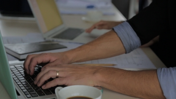 Modern Businessman Working On a Laptop