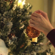 Placing a Christmas Ornament on Tree - VideoHive Item for Sale