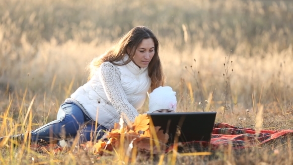 Mother With Child And Laptop