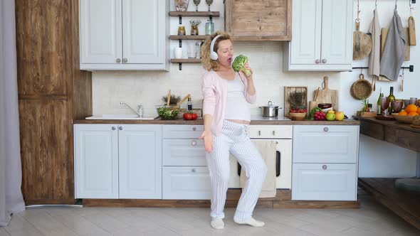 Pregnant Woman Singing In Broccoli And Dancing In Kitchen