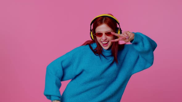 Cheerful Attractive Girl Listening Music Via Headphones and Dancing Disco Fooling Around Having Fun