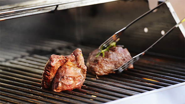 Sealing Steak on BBQ Grill