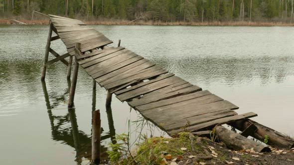 Old Wooden Bridge on the Lake