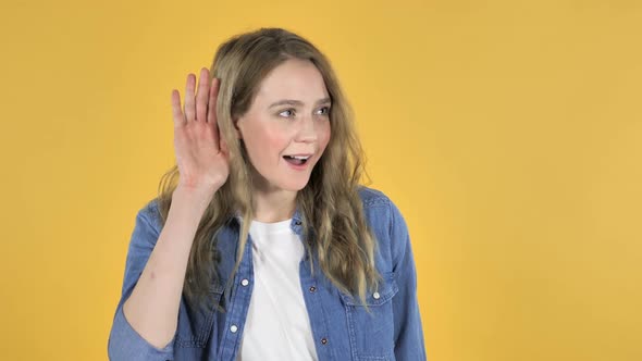 Beautiful Pretty Girl Listening Secret Yellow Background