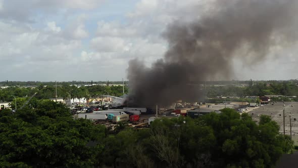 Aerial News Footage Industrial District On Fire Junk Yard Cars