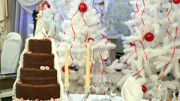 Cake With Figurines of the Newlyweds 