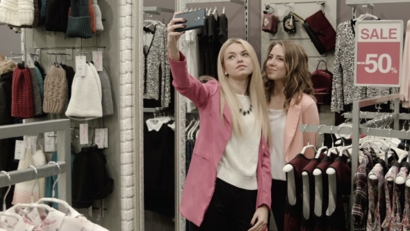 Girlfriends Do The Selfie In Clothing Store