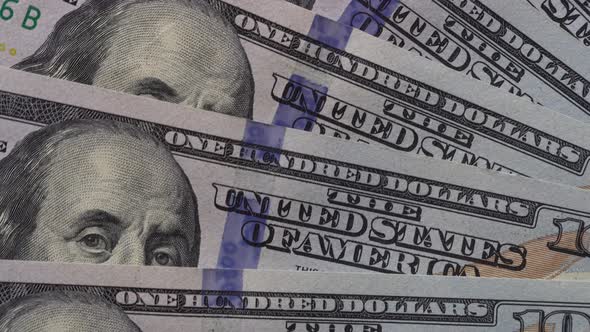 Paper money rotate close up. Background with money american hundred dollar bills