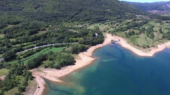 Flying above beautiful landscape of artificial lake of Peruca, Croatia