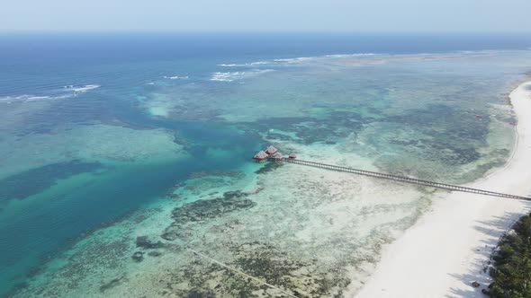 Aerial View of a House on Stilts in the Ocean on the Coast of Zanzibar Tanzania Slow Motion